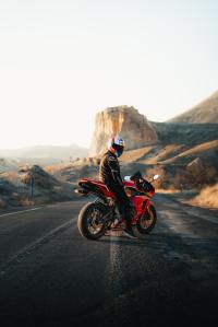 Motorcycle rider on a mountain road